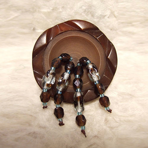 P-115 Rare brown cut-glass and Czech glass seed beads on a carved, bakelite button.