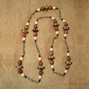 G-32 Only Italian glassmakers could produce these distinctive handblown beads! Faceted goldstone...