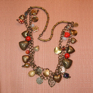 H-37 Brass is beautiful! Antiqued brass hearts, charms and unusual glass...