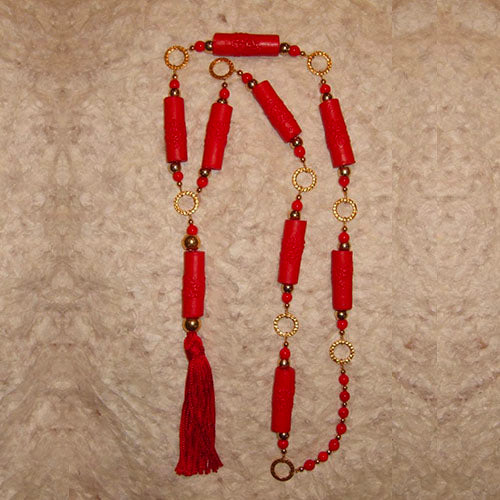 I-5 Wear this bright red accent piece all year long! The unusual circular...
