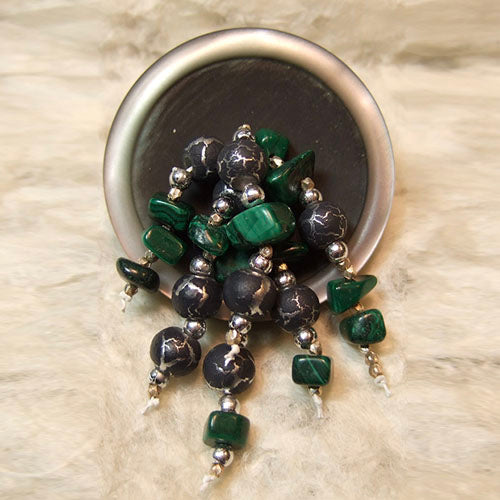 P-111 Malachite chips and silver Czech glass seed beads on a gun-metal-and-pearl finish button.