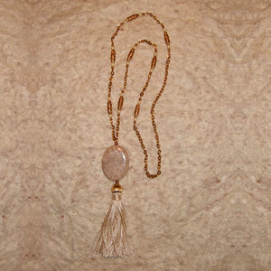 S-13 Love the neutral tones of this necklace! The tasseled pendant...