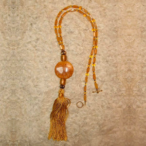 S-15 Don’t shy away from this necklace with its bright golden yellow...