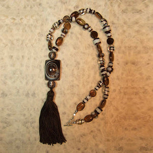 S-9 This necklace enhances any of the warm browns you have...