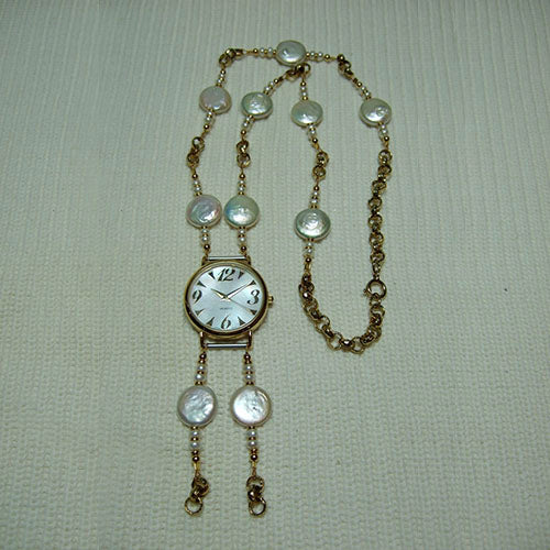 T-14 This necklace is so lovely. The quartz watch face is mother-of-pearl shell.
